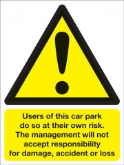 Users Of This Car Park Do So At Their Own Risk Signs